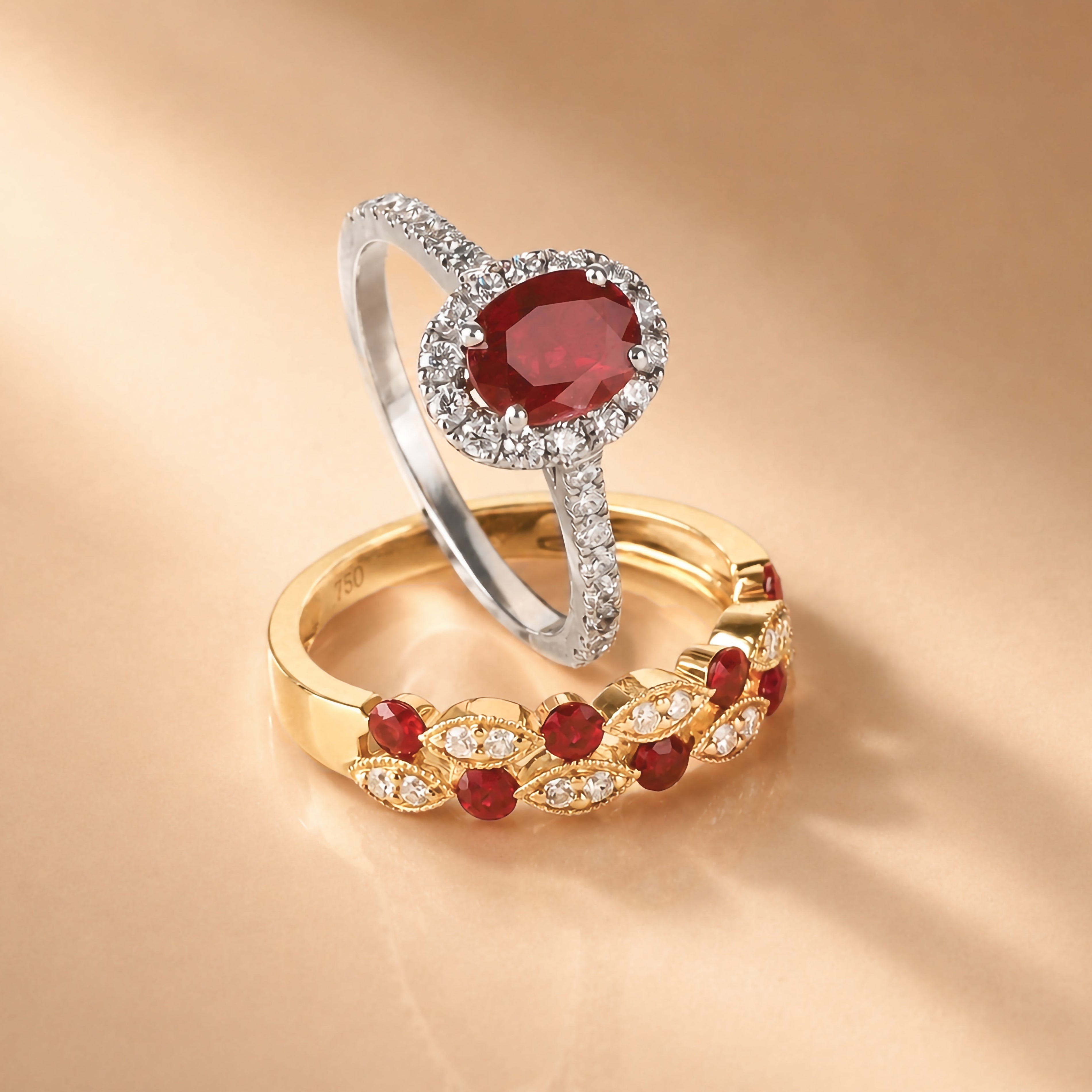 Ruby and diamond halo ring and ruby and diamond double band ring