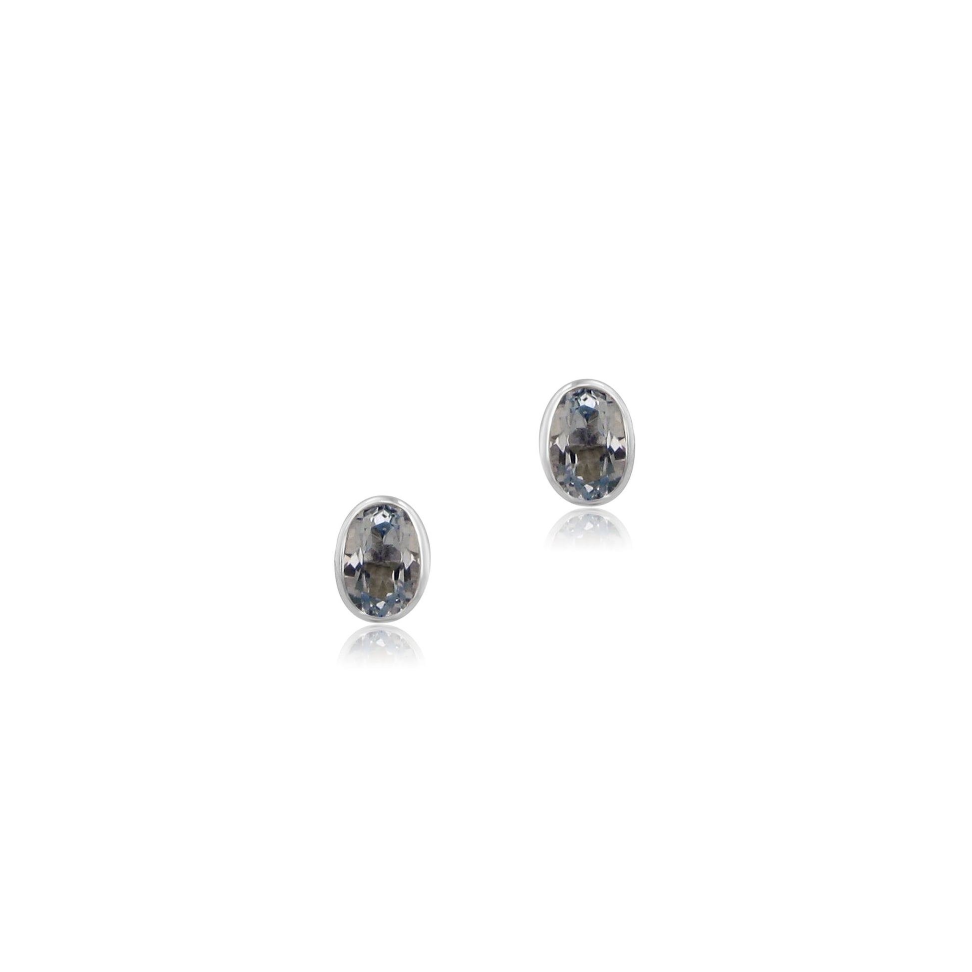 9ct White Gold Oval Blue Topaz Stud Earrings EWT36201