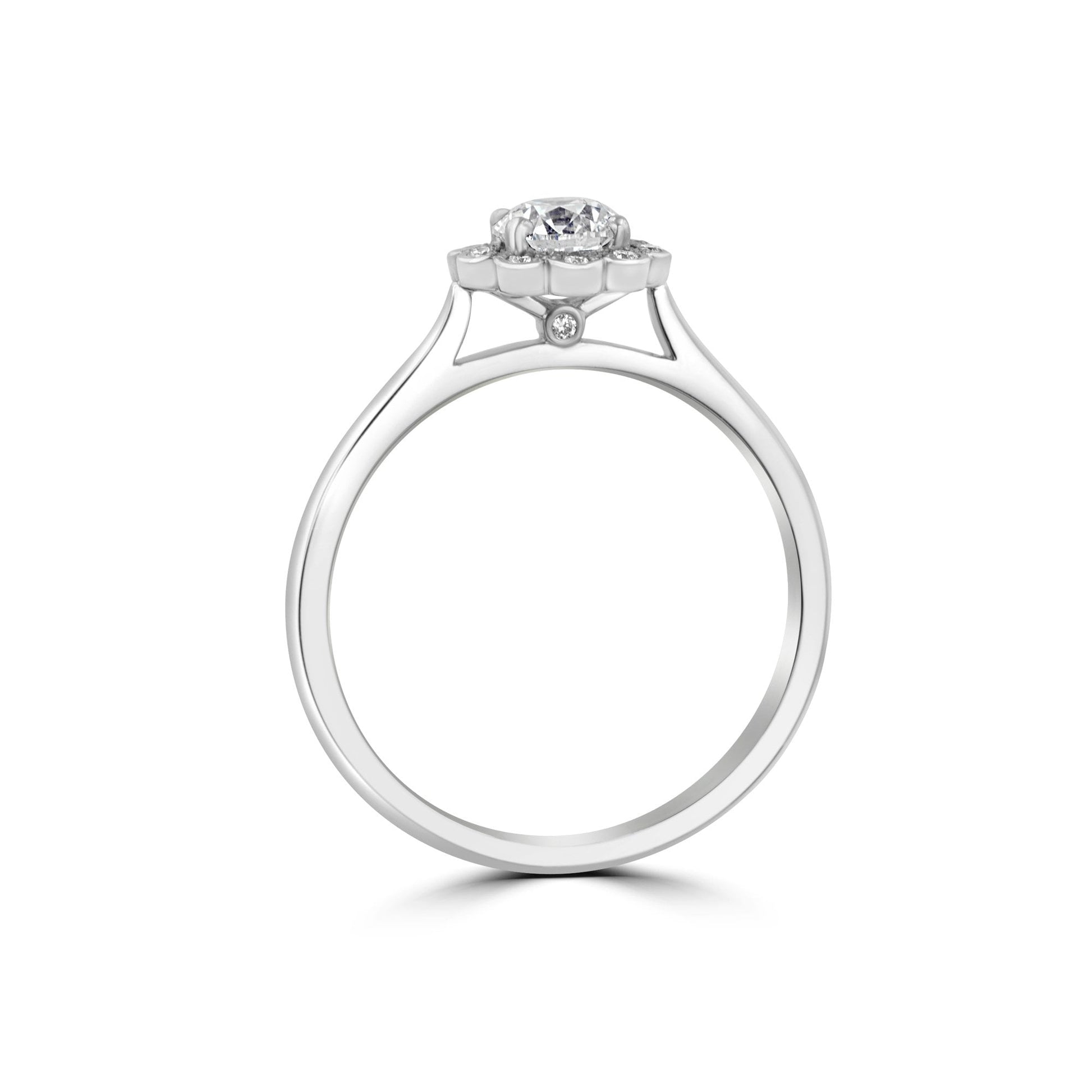 Platinum Diamond Halo Engagement Ring With a GIA E Colour Half Carat Centre