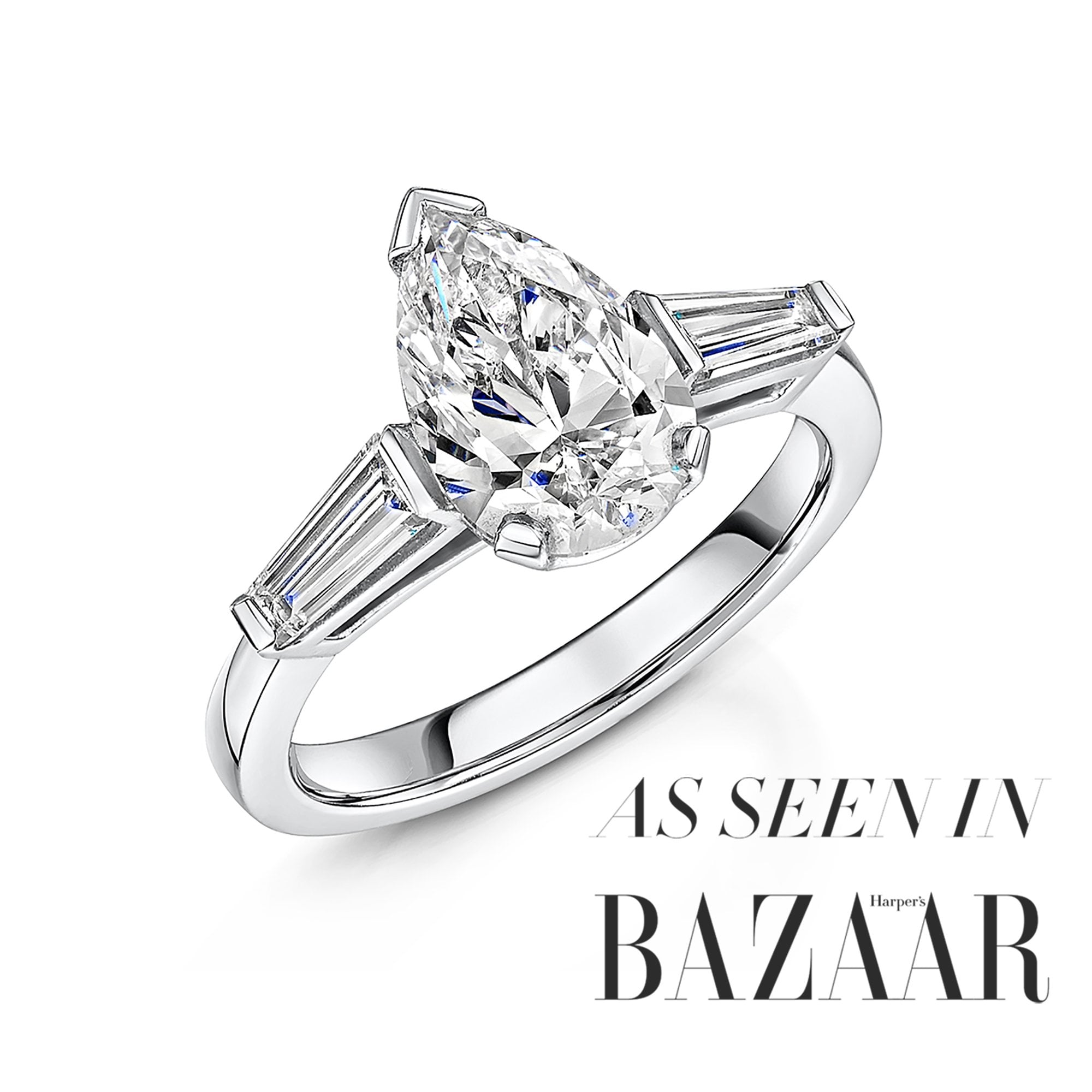 Platinum Two Carat Pear Diamond Ring With a Baguette Diamond Each Side