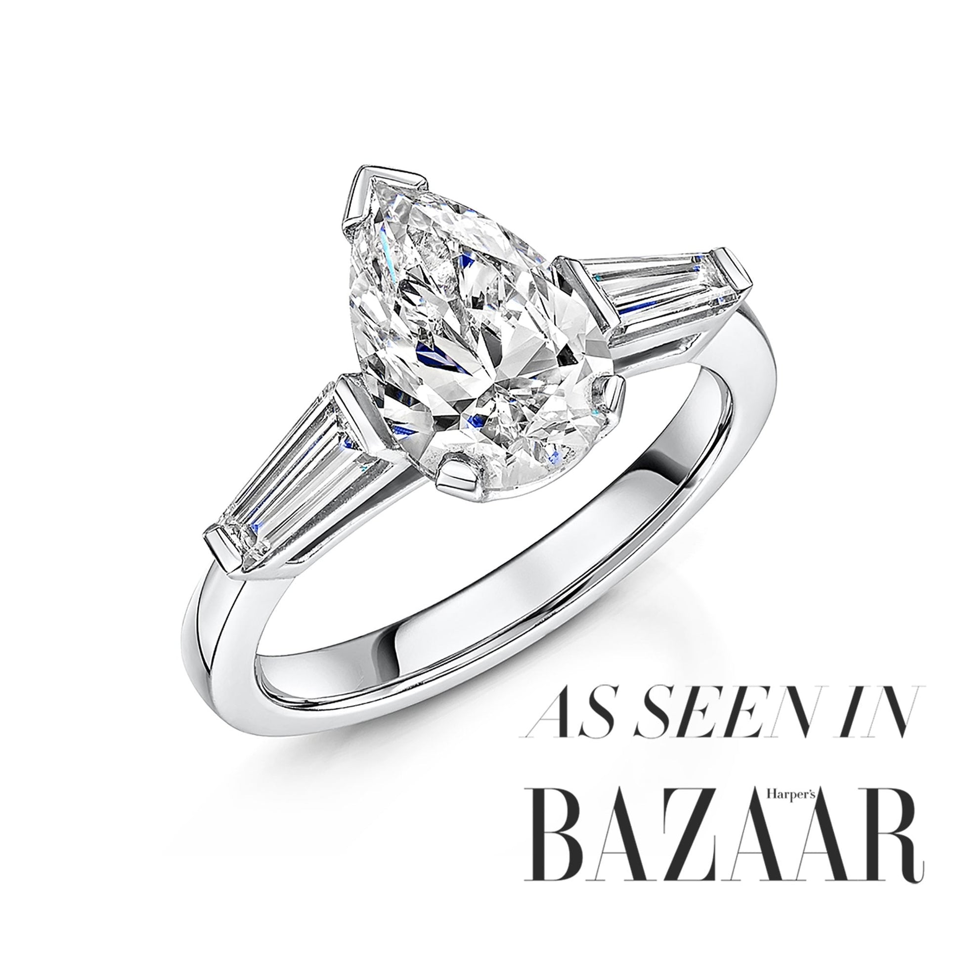 Platinum Two Carat Pear Diamond Ring With a Baguette Diamond Each Side