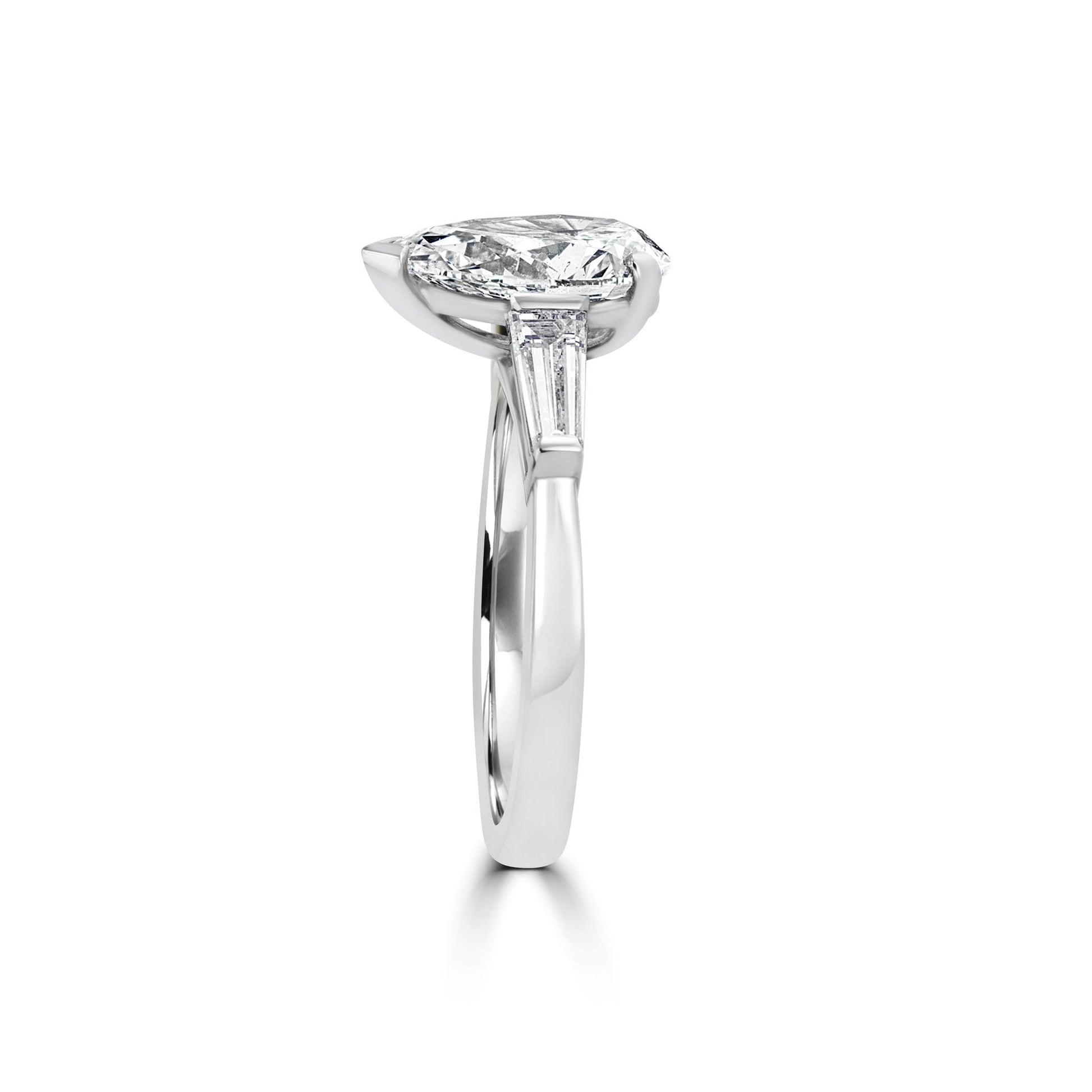 Platinum Two Carat Pear Diamond Ring With a Baguette Diamond Each Side