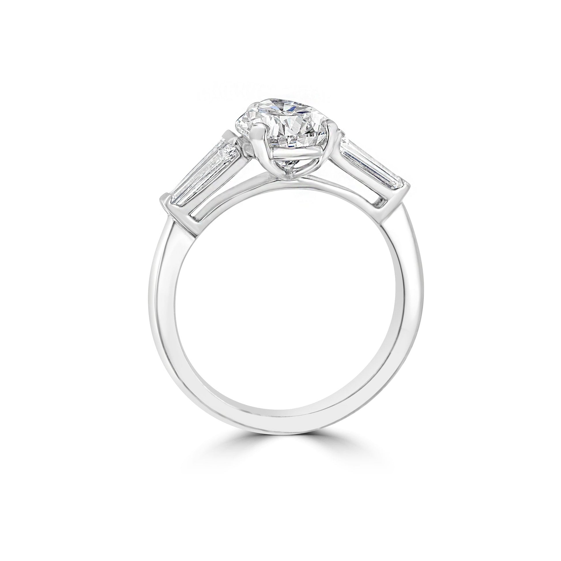 Platinum Two Carat Pear Diamond Ring With a Baguette Diamond Each Side