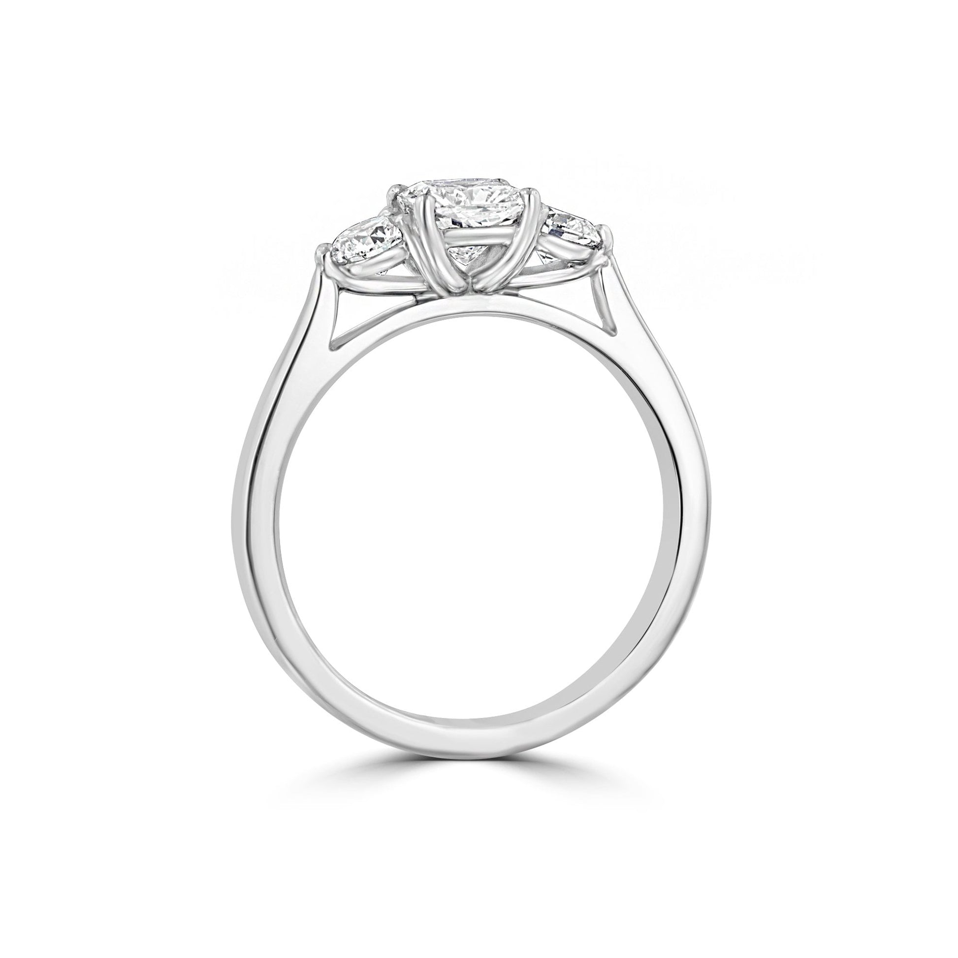 Platinum Trilogy Engagement Ring With Claw Set Cushion Cut Centre Stone And Two RBC Diamonds