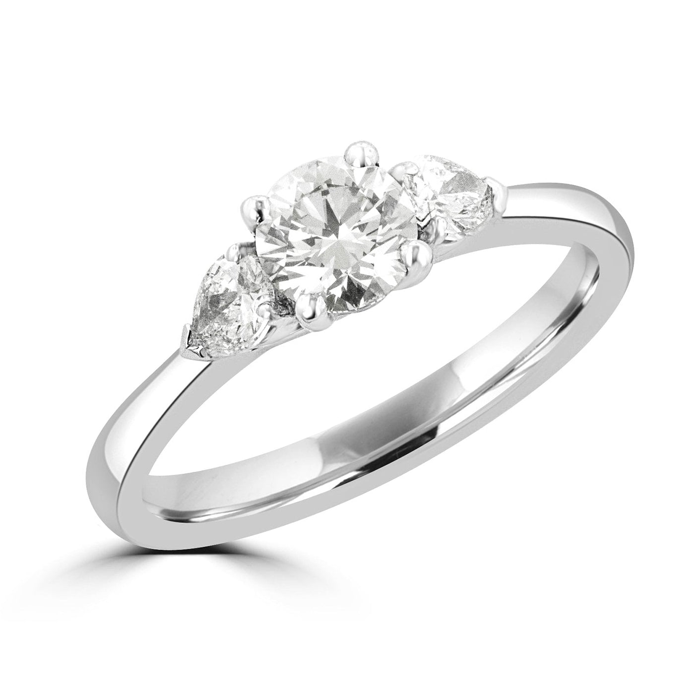 Round and Pear Shape Diamond Three Stone Ring in Platinum