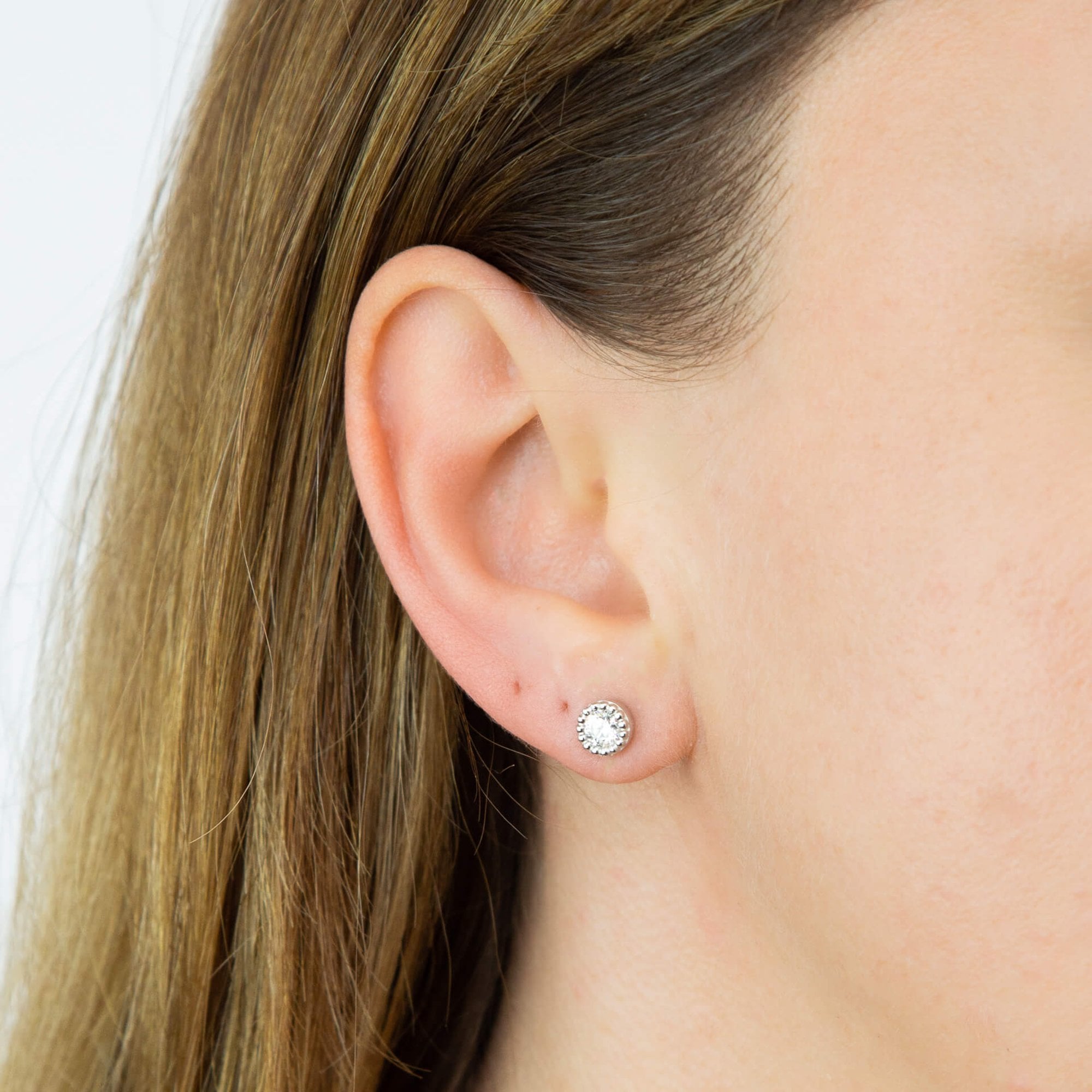 Silver Round CZ Stud Earrings With Mill Grain Edge