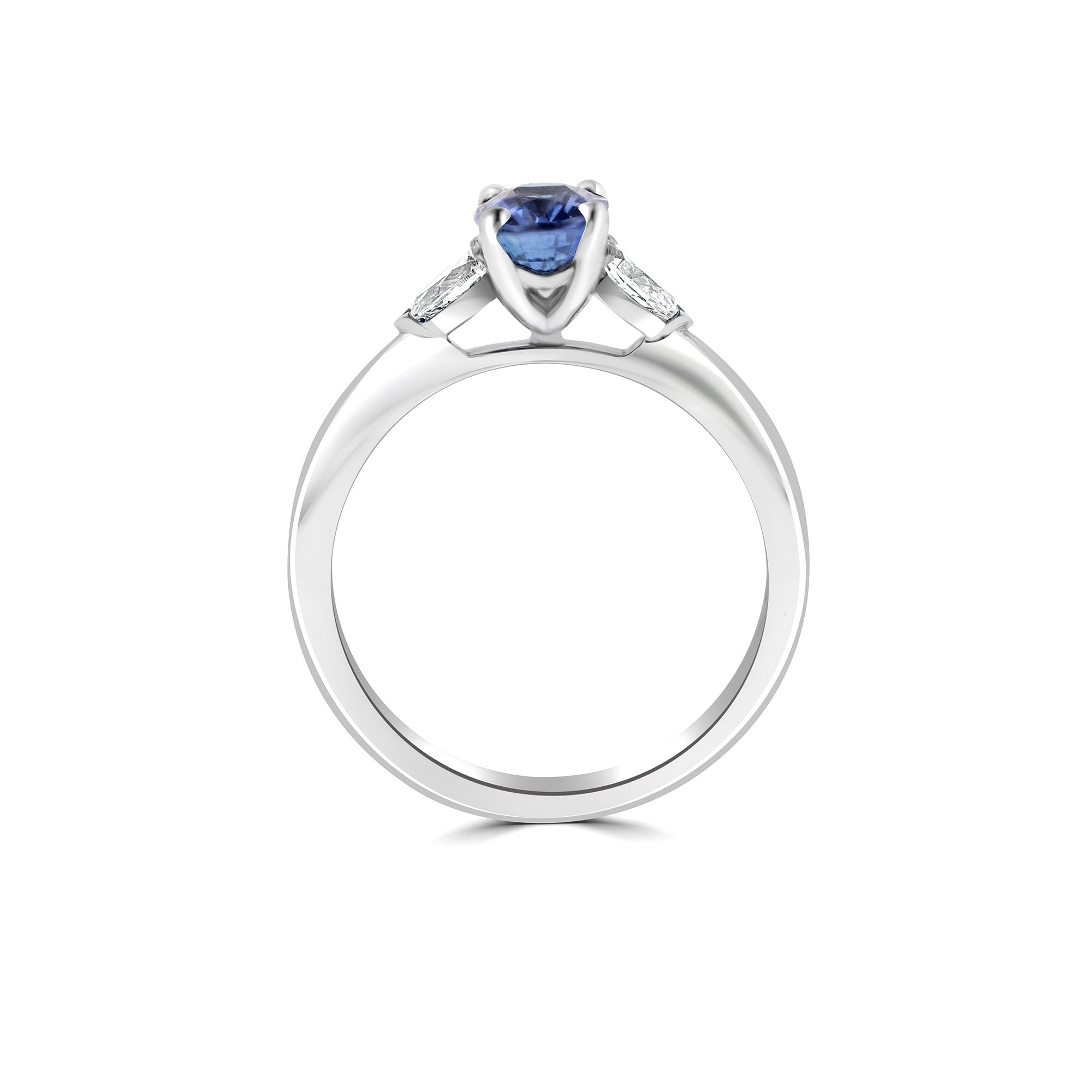 Platinum Three Stone Ring with an Oval Light Blue Ceylon Sapphire A+