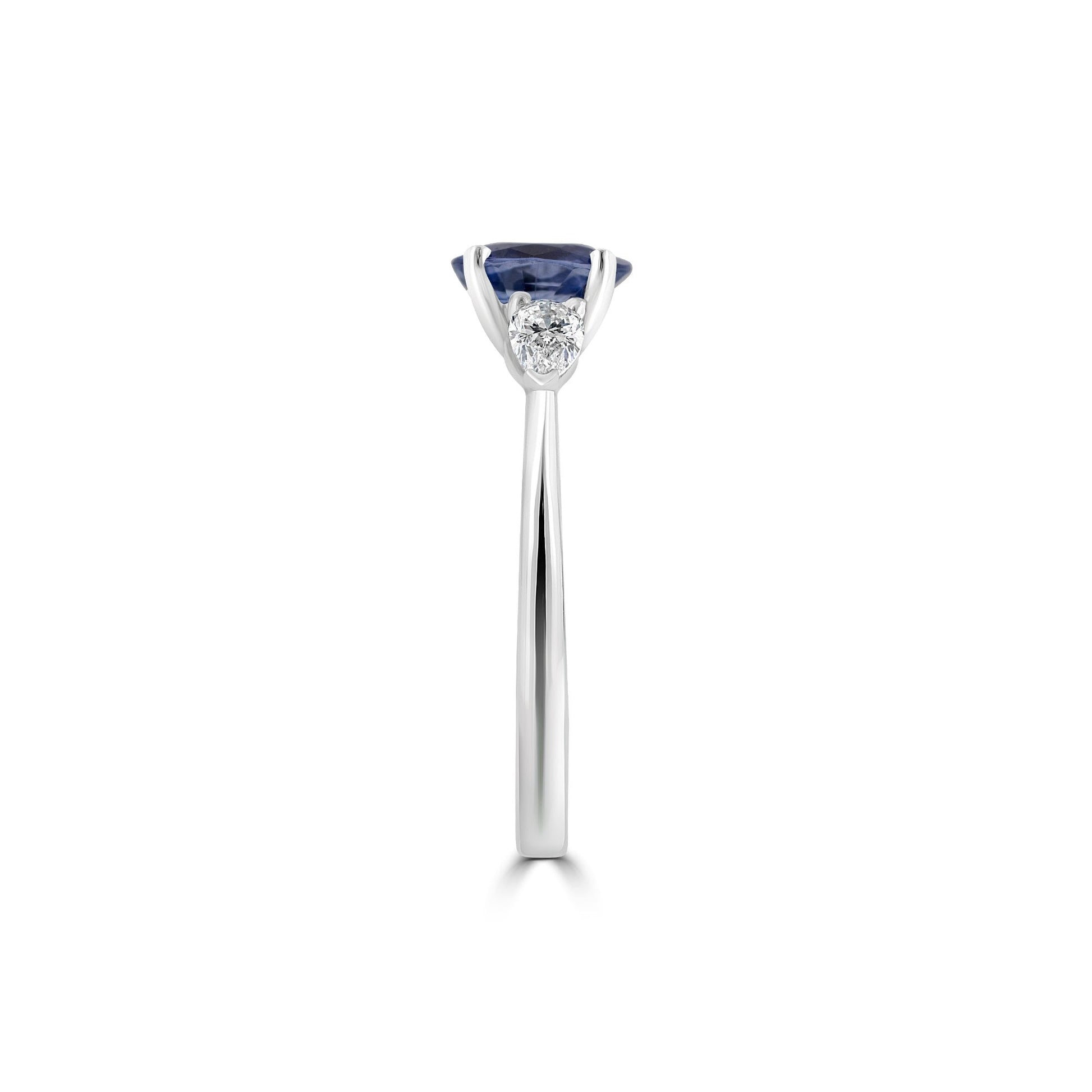 Platinum Three Stone Ring with an Oval Light Blue Ceylon Sapphire A+