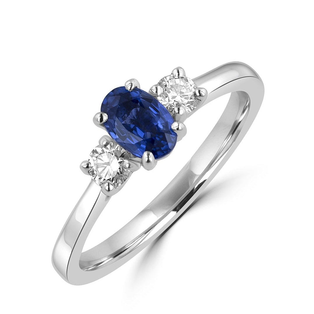 Platinum Three Stone Ring with Sapphire Oval and Diamonds