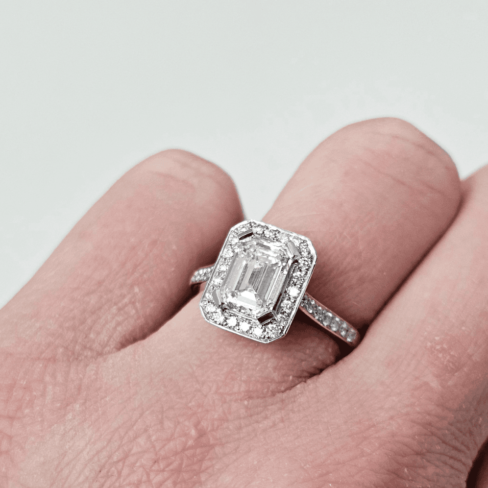 Platinum Art Deco Halo Engagement with 2.01ct Emerald Cut Diamond Pre-Owned Ring