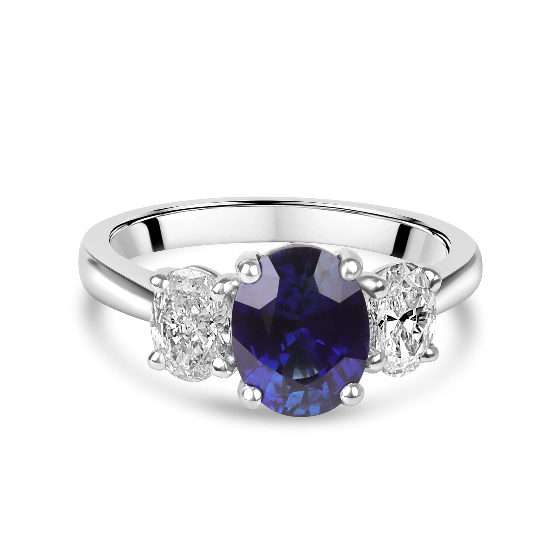 Platinum 2.31ct Oval Sapphire and 0.71ct Oval Diamond Three Stone Ring