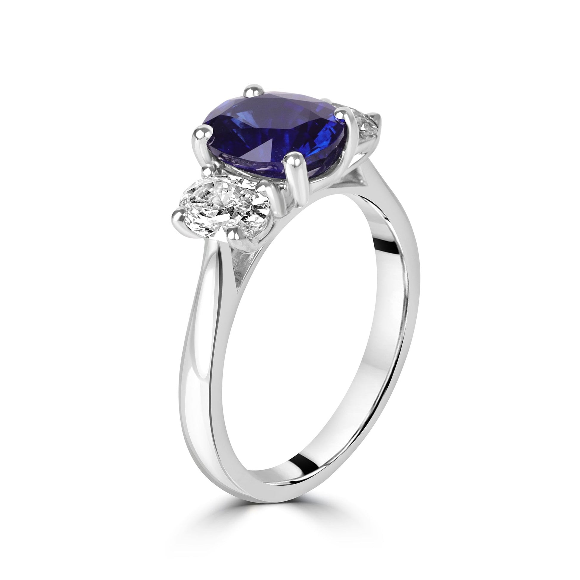 Platinum 2.31ct Oval Sapphire and 0.71ct Oval Diamond Three Stone Ring