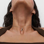 model wearing PDPAOLA sterling silver initial A necklace with cz