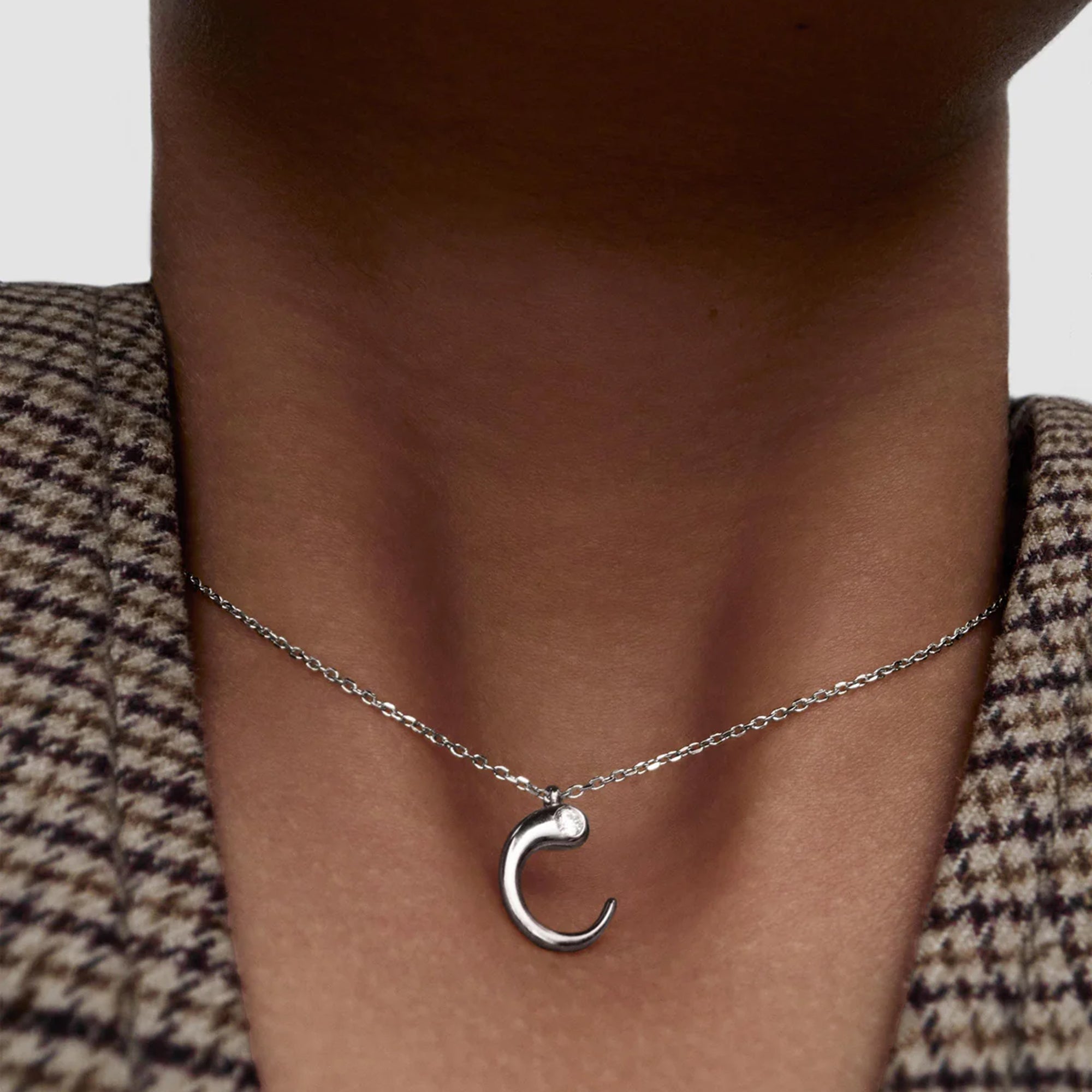 model wearing PDPAOLA sterling silver initial C necklace