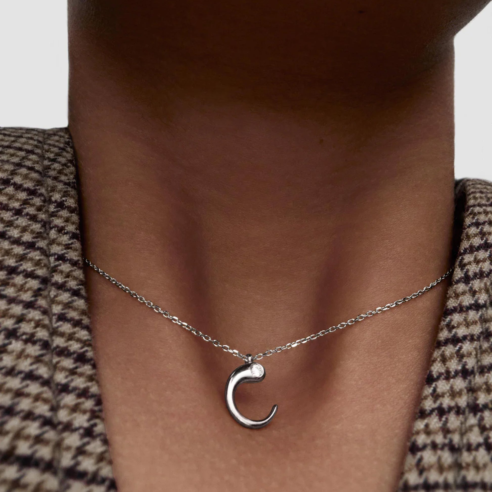 model wearing PDPAOLA sterling silver initial C necklace