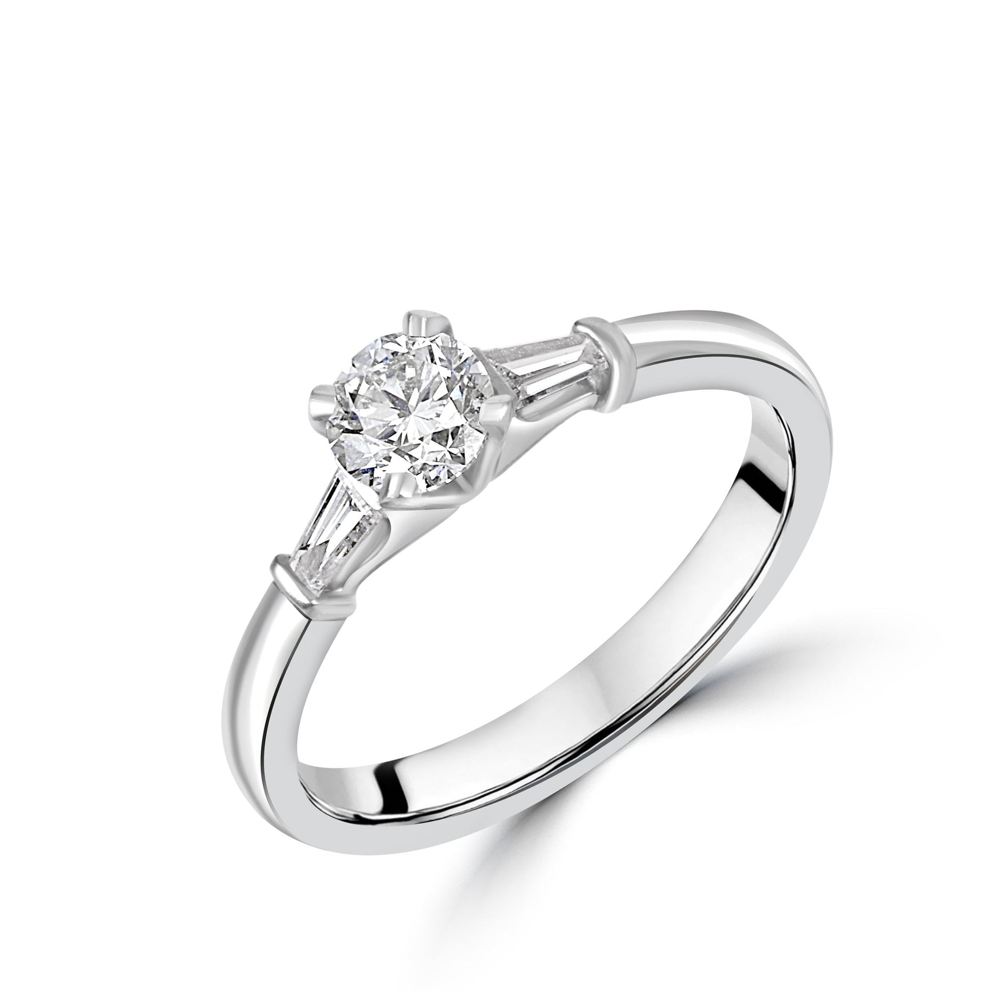 Platinum Round and Baguette Diamond Three Stone Ring
