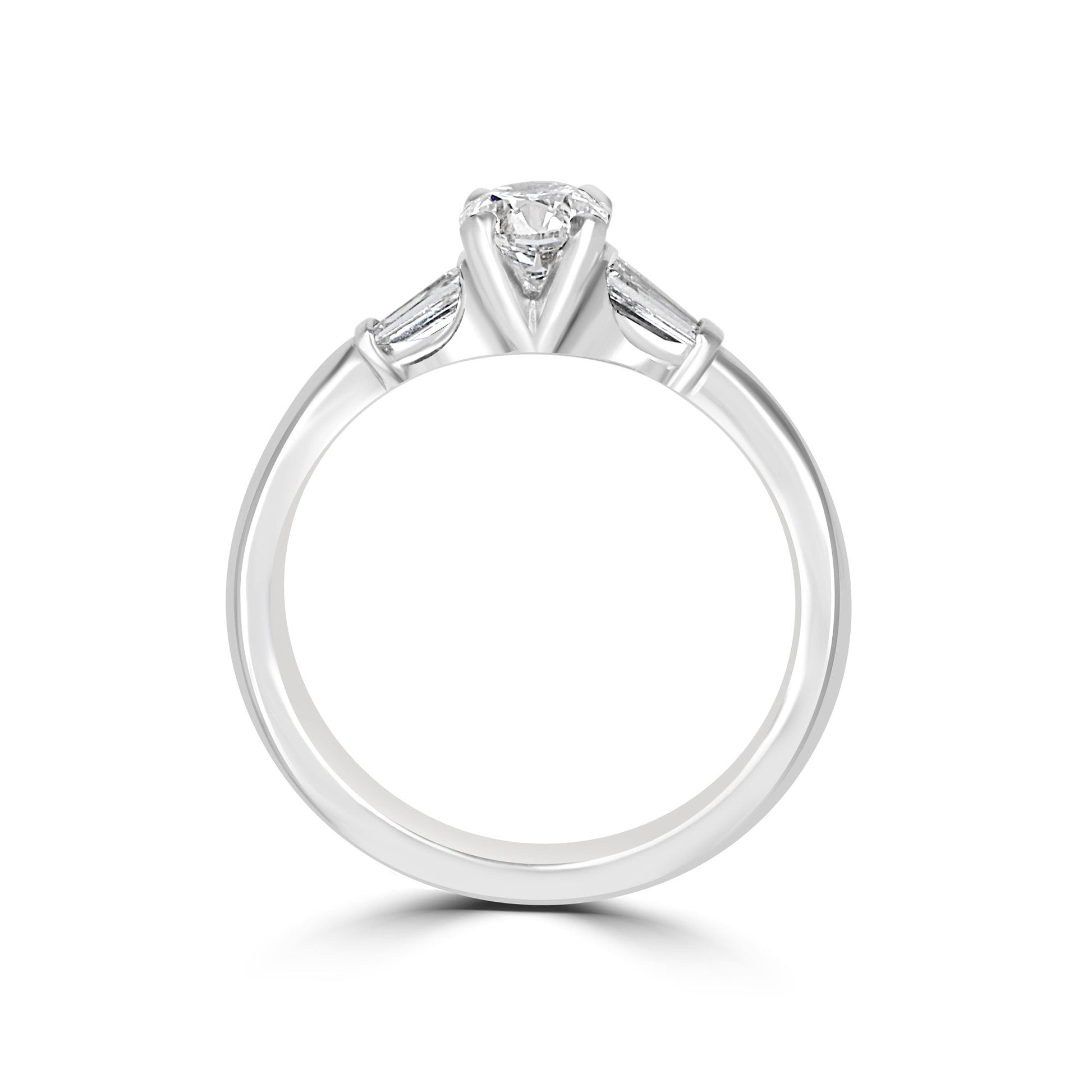 Platinum Round and Baguette Diamond Three Stone Ring