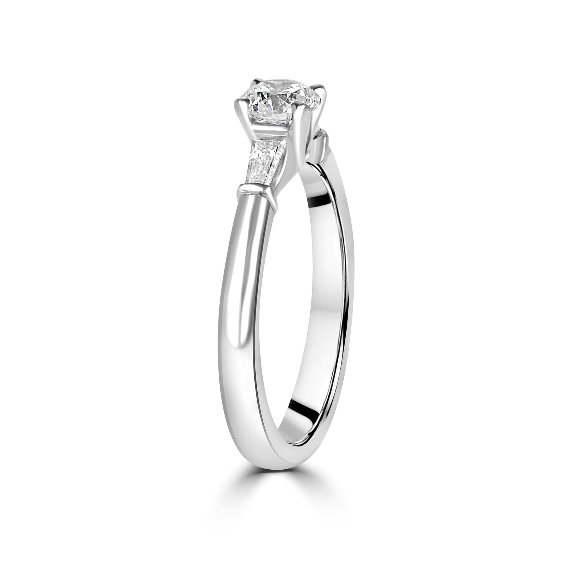 Platinum Round and Baguette Diamond Three Stone Ring