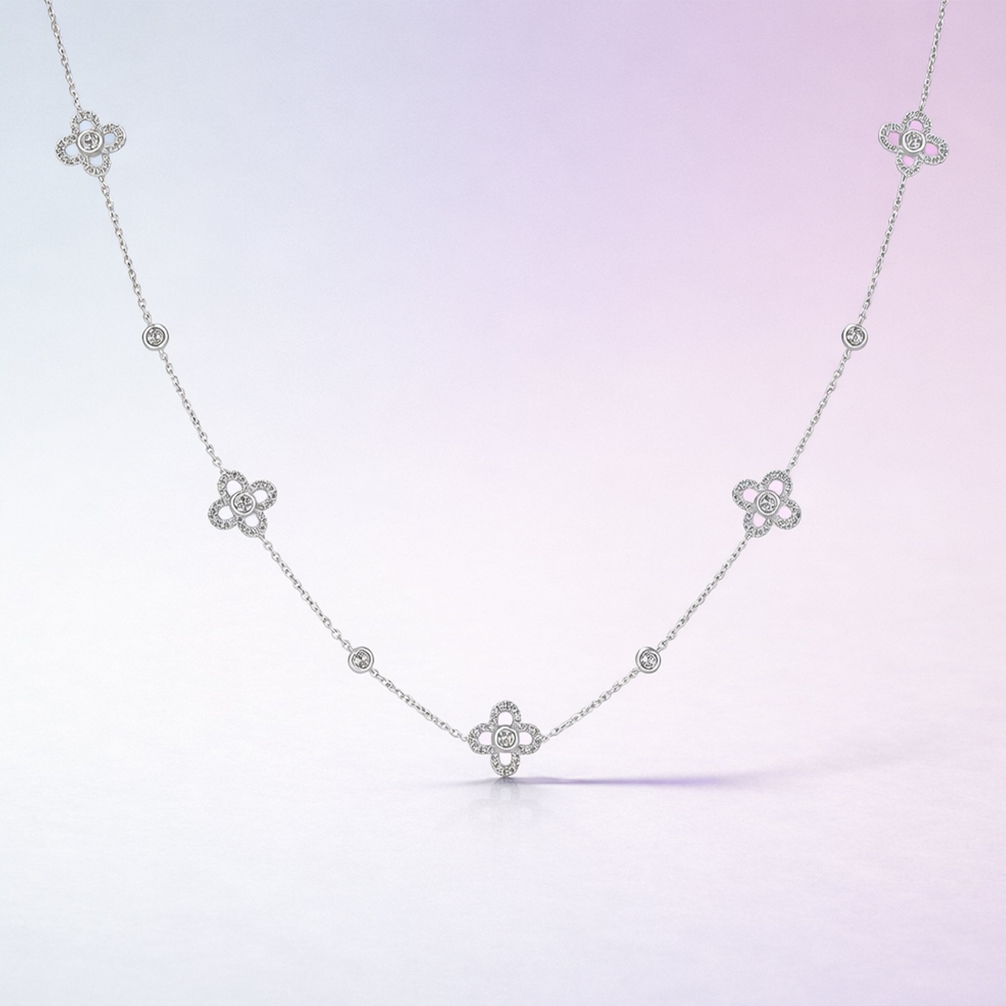 18ct White Gold Necklace With Five Diamond Set Flowers Spaced on The Chain