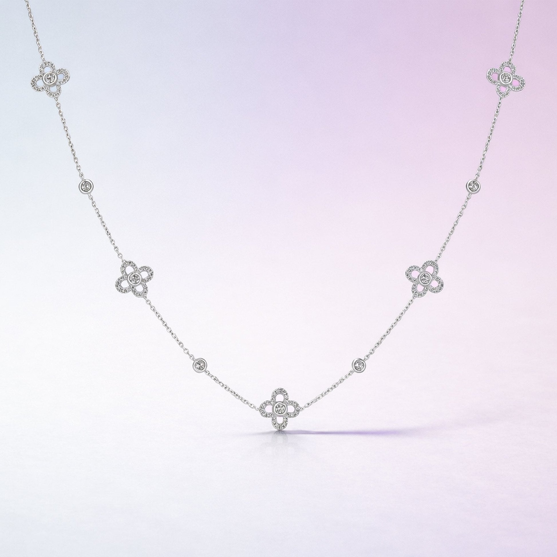 18ct White Gold Necklace With Five Diamond Set Flowers Spaced on The Chain