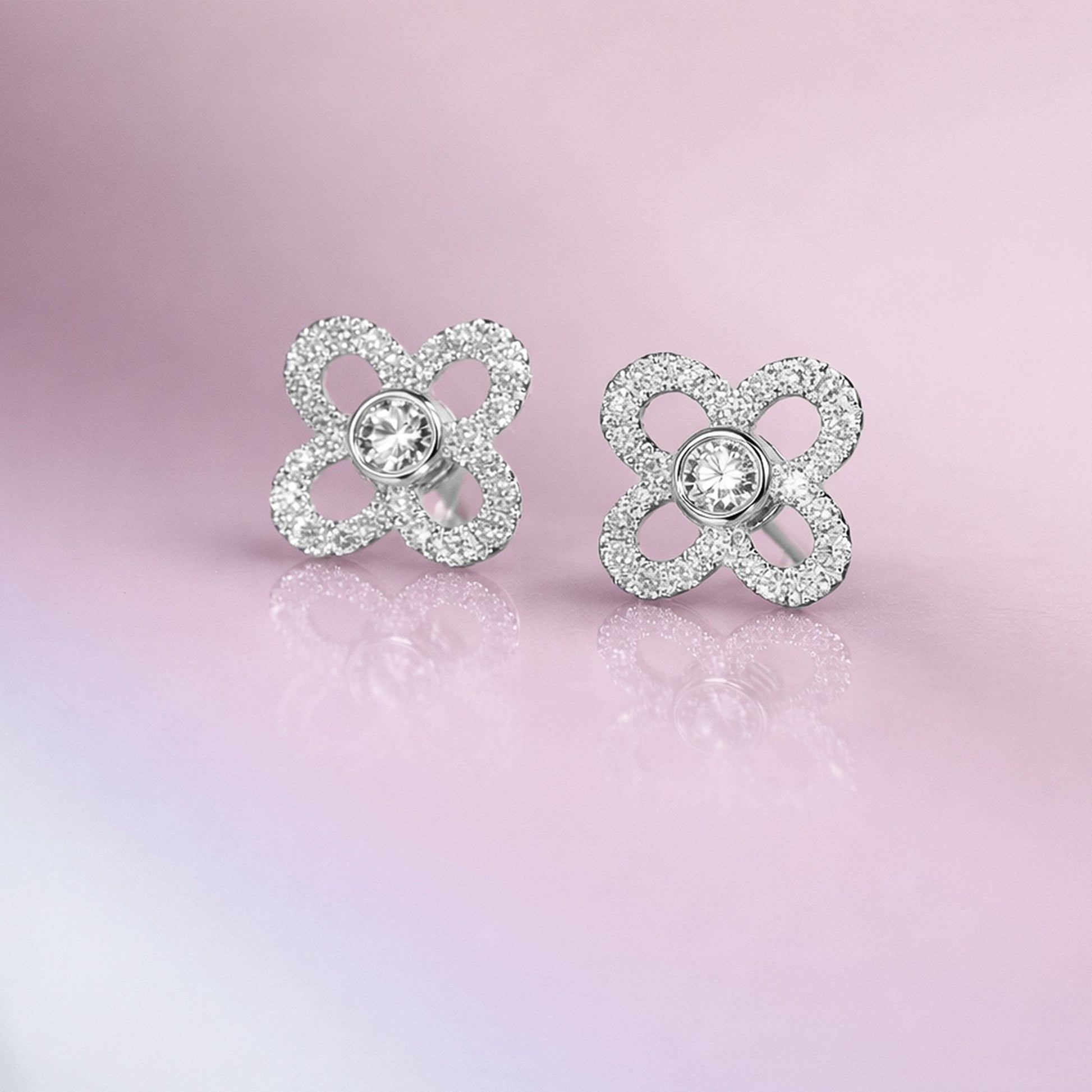 18ct White Gold Open Flower Shaped Stud Earrings With Diamonds