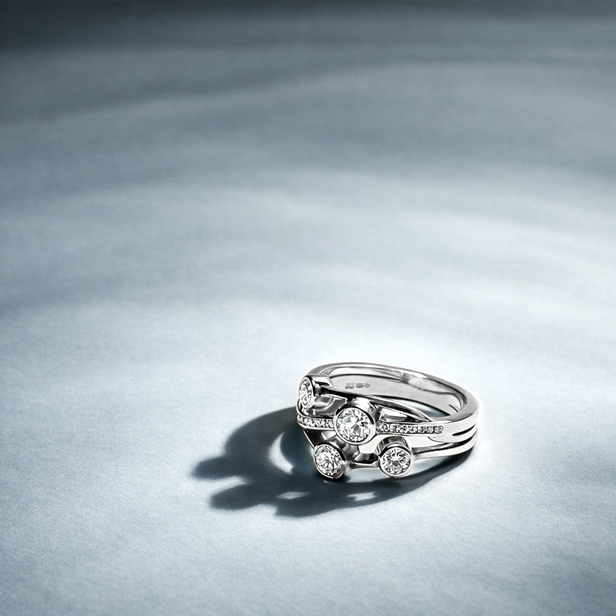 Platinum 0.69ct Round Diamond 'Cascata' Crossover Bubble Ring