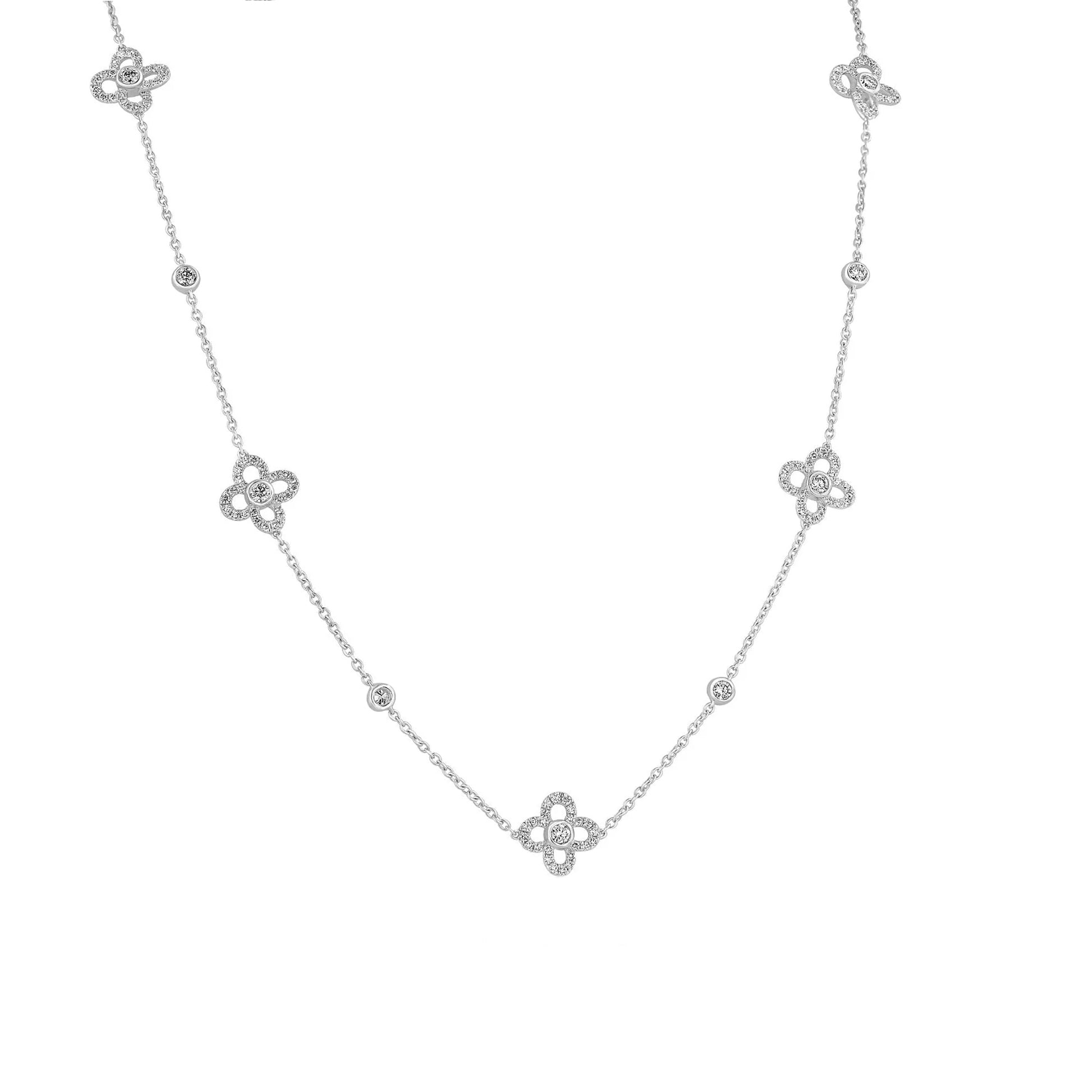 18ct White Gold Necklace With Five Diamond Set Flowers Spaced on The Chain