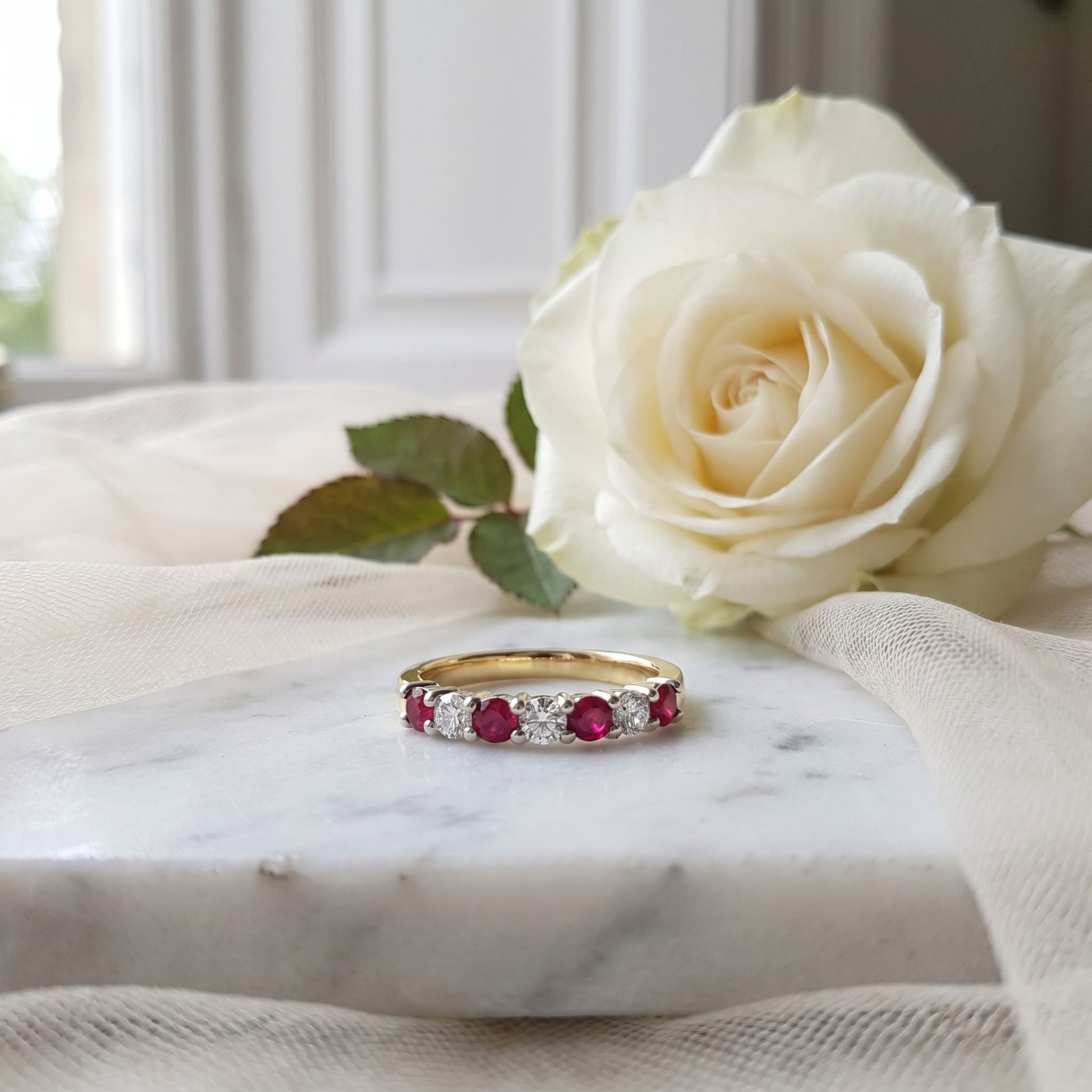 18ct Gold Ruby and Diamond Seven Stone Ring
