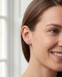 18ct White Gold Earrings with 0.86ct Princess Cut Sapphires and 0.19ct Diamond Huggie Hoops
