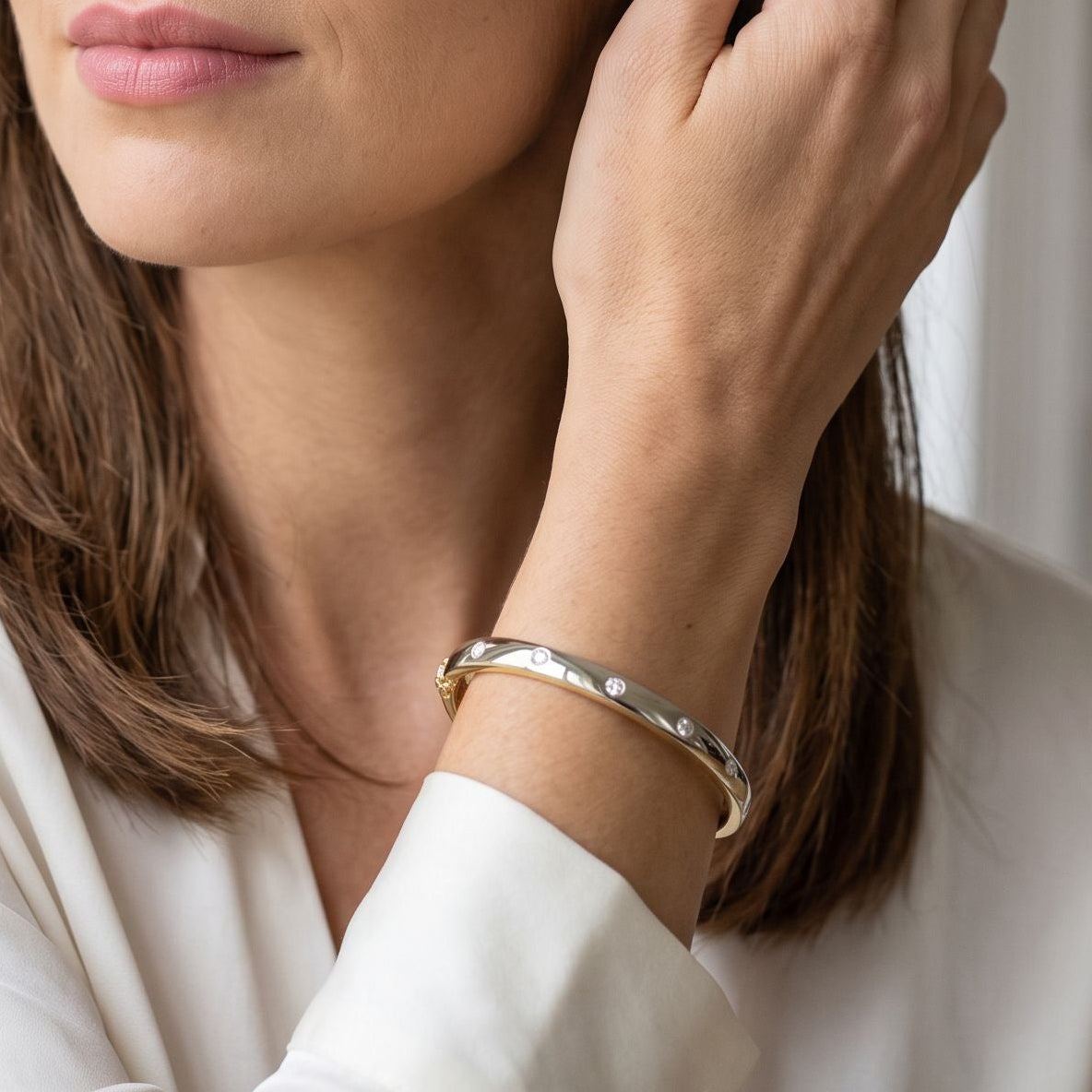 18ct Yellow and White Gold Seven Stone Diamond Bangle