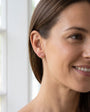 9ct Yellow Gold 0.17ct Round Ruby and 0.04 Round diamond 'Cascata' Half Hoop Earrings
