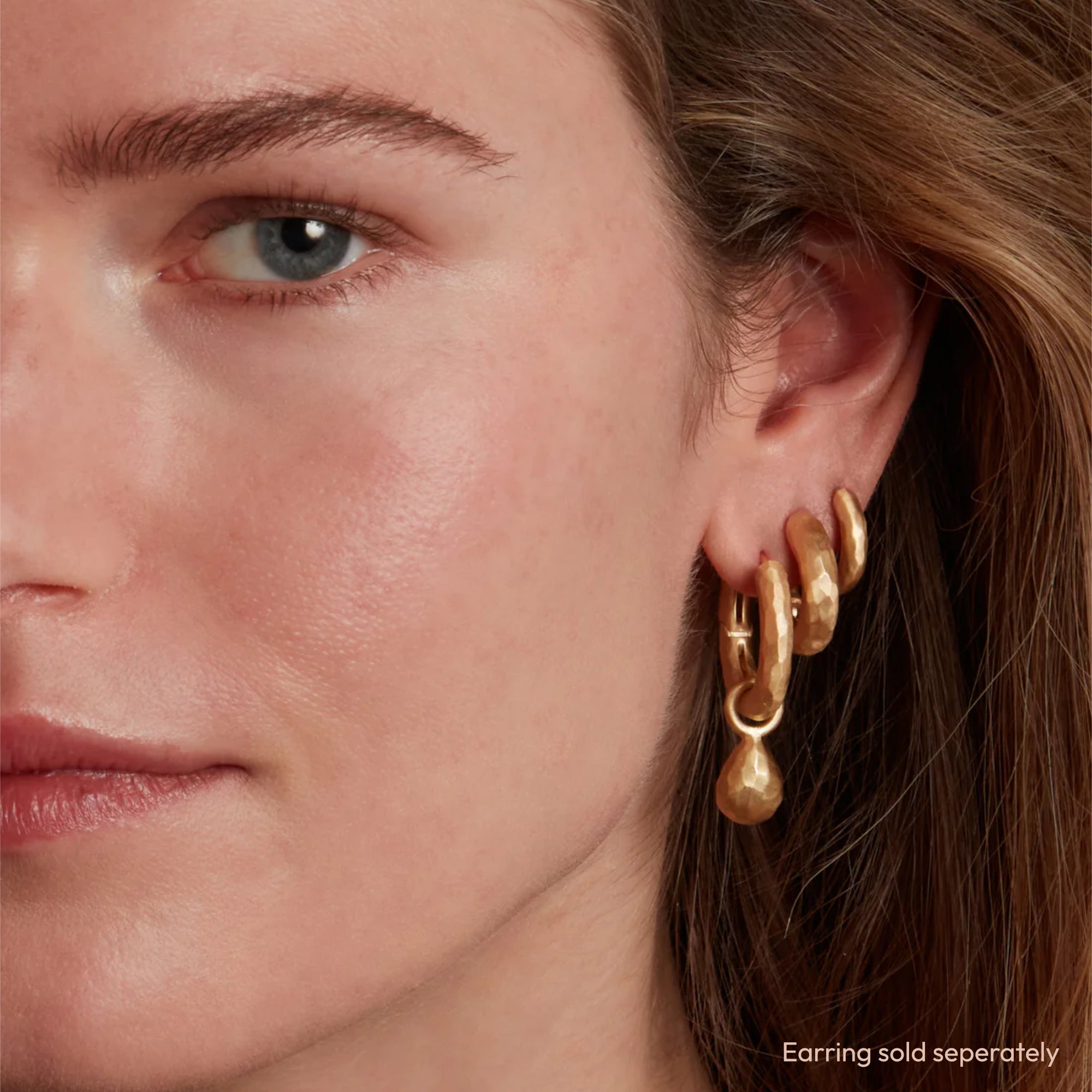 Model Wearing Stacked Hoop Earrings and Eloise Gold Plated Sterling Silver Small Milestone Drop Charm on One Hoop Earring