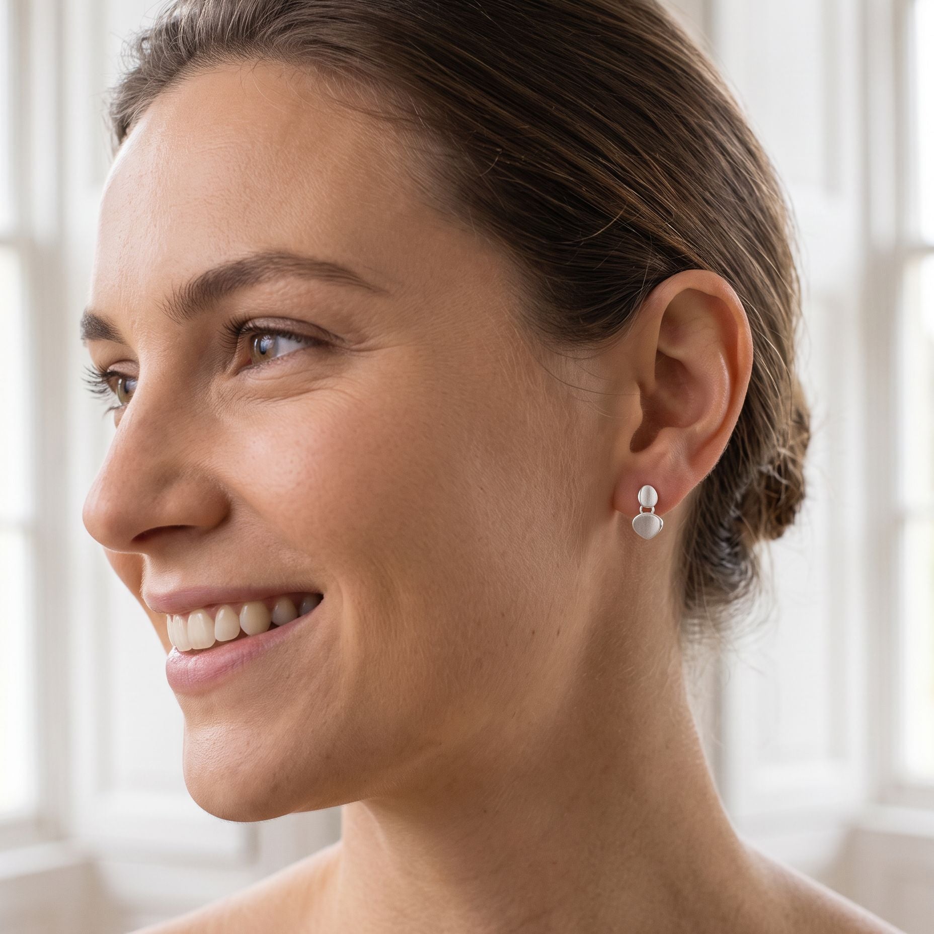 Double Satin Concave Pebble Drop Earrings With Polished Edges