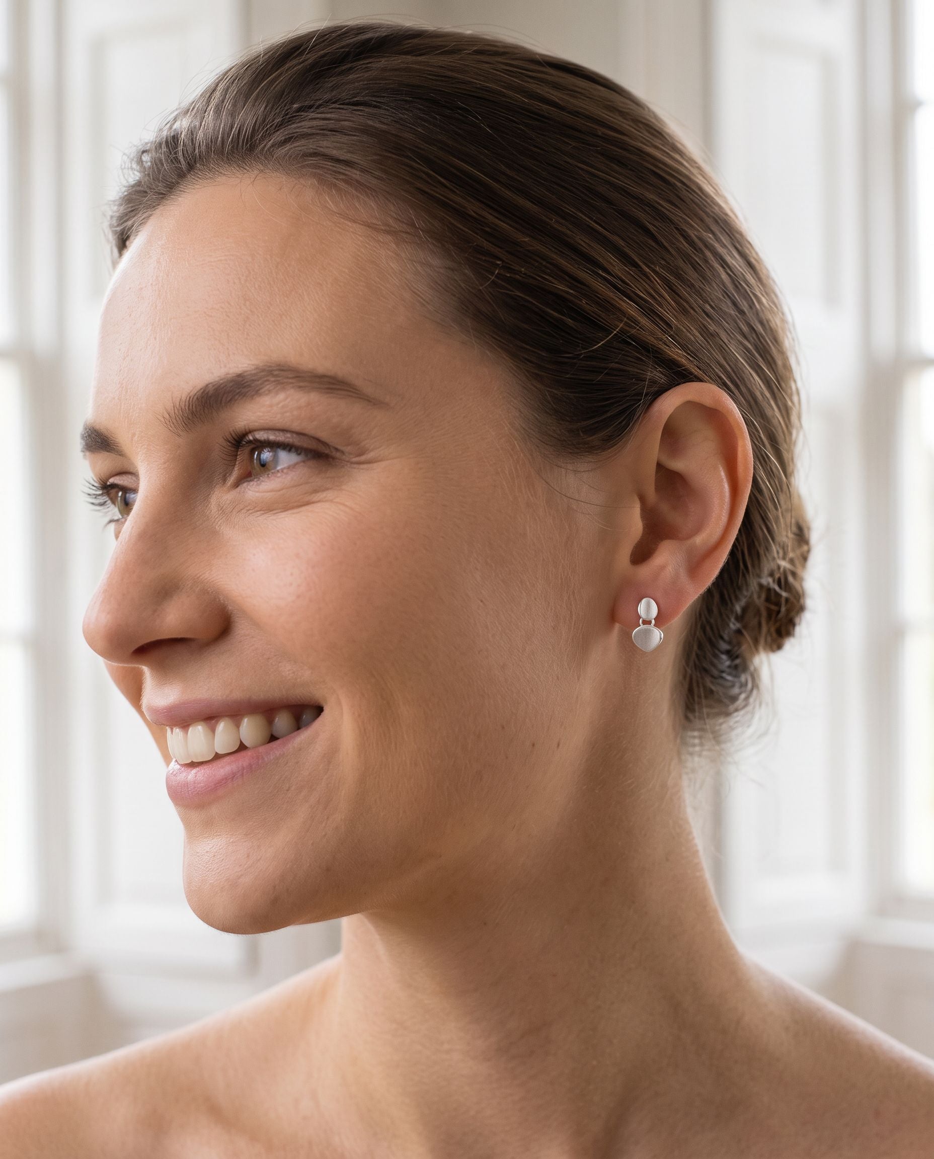 Double Satin Concave Pebble Drop Earrings With Polished Edges