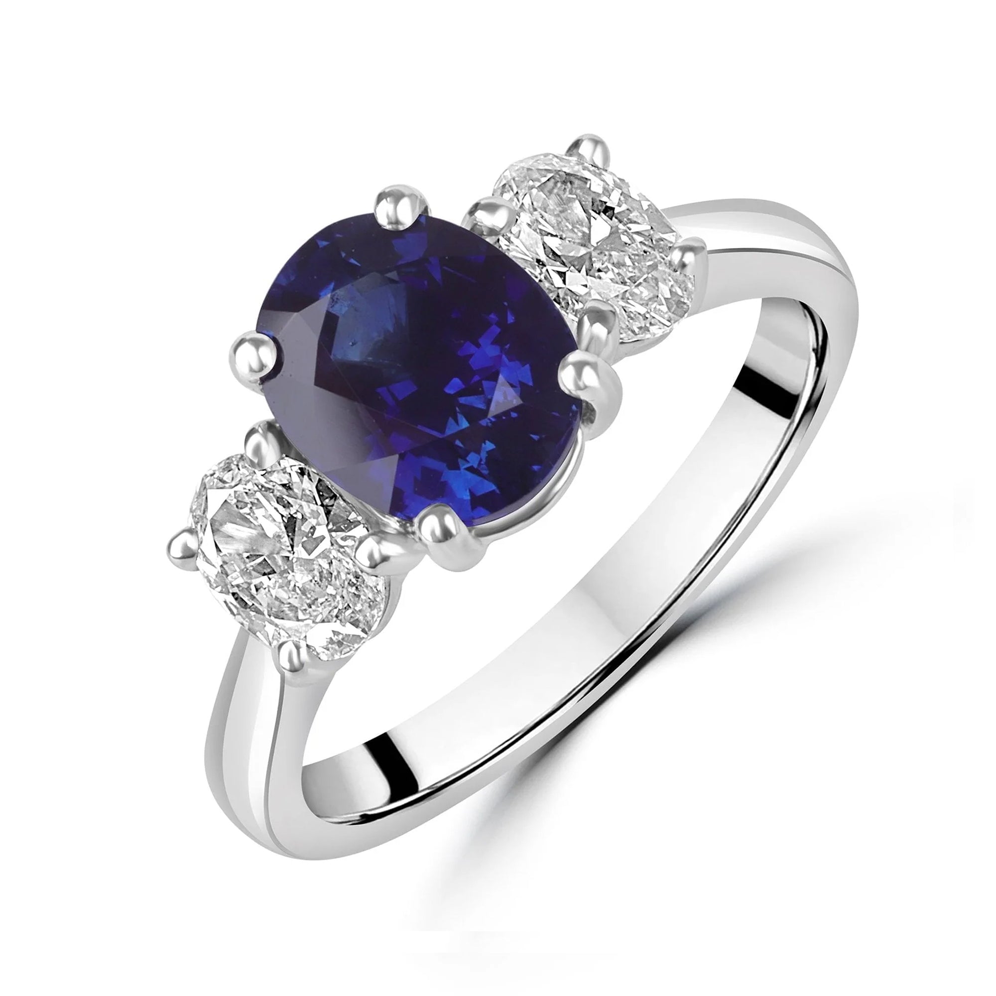 Platinum 2.31ct Oval Sapphire and 0.71ct Oval Diamond Three Stone Ring