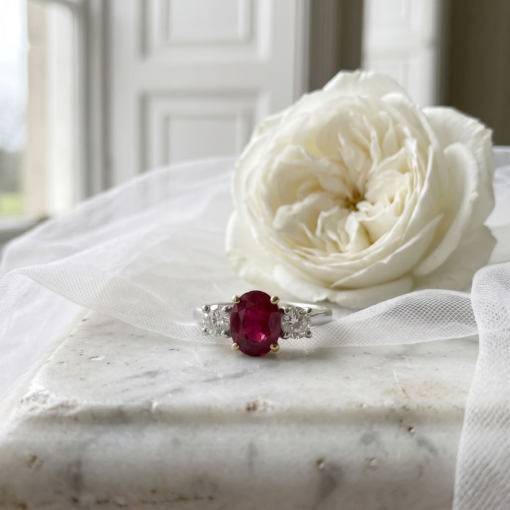 Platinum 1.25ct Ruby and Diamond Three Stone Ring