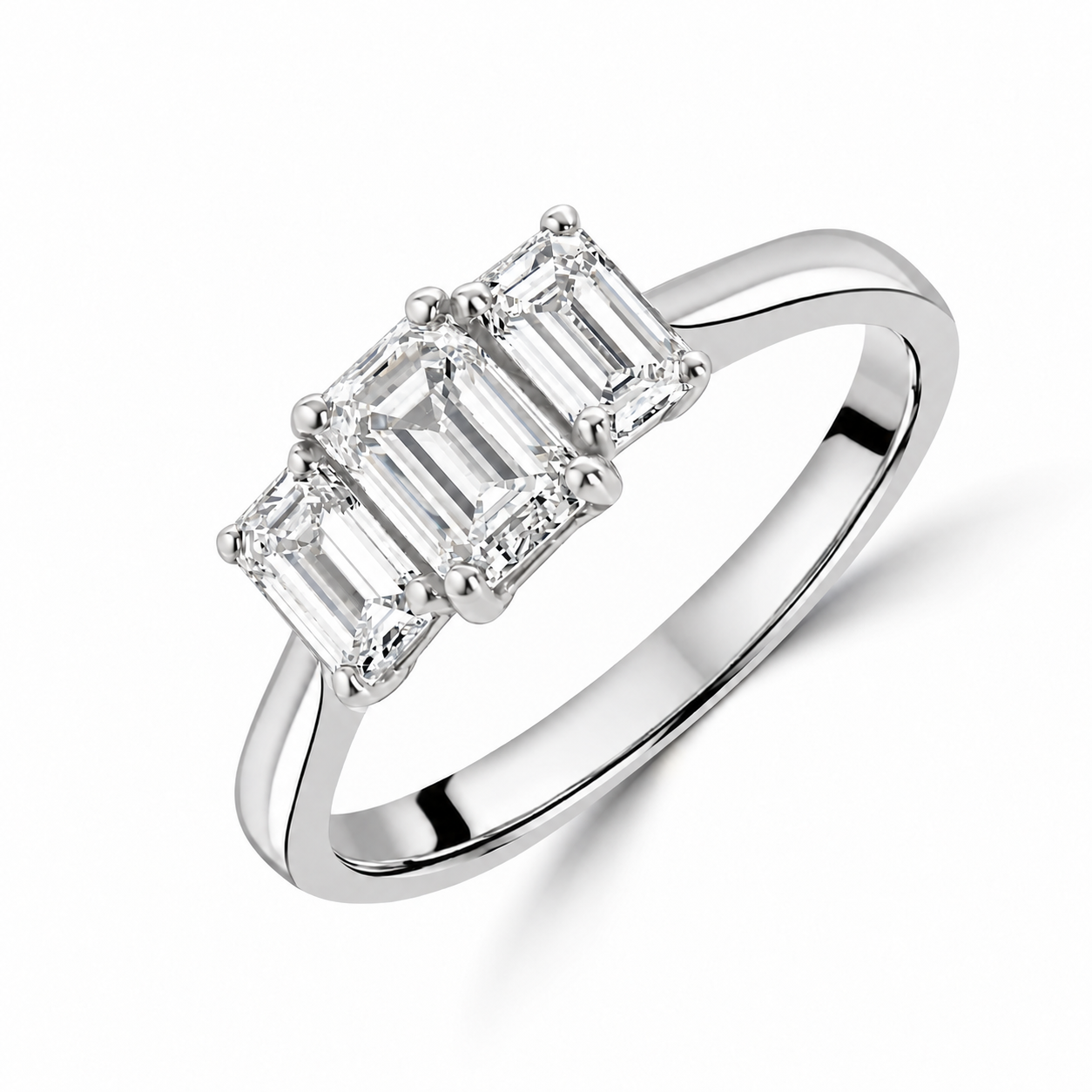 Platinum 1.31ct Emerald Cut Diamond Three Stone Ring