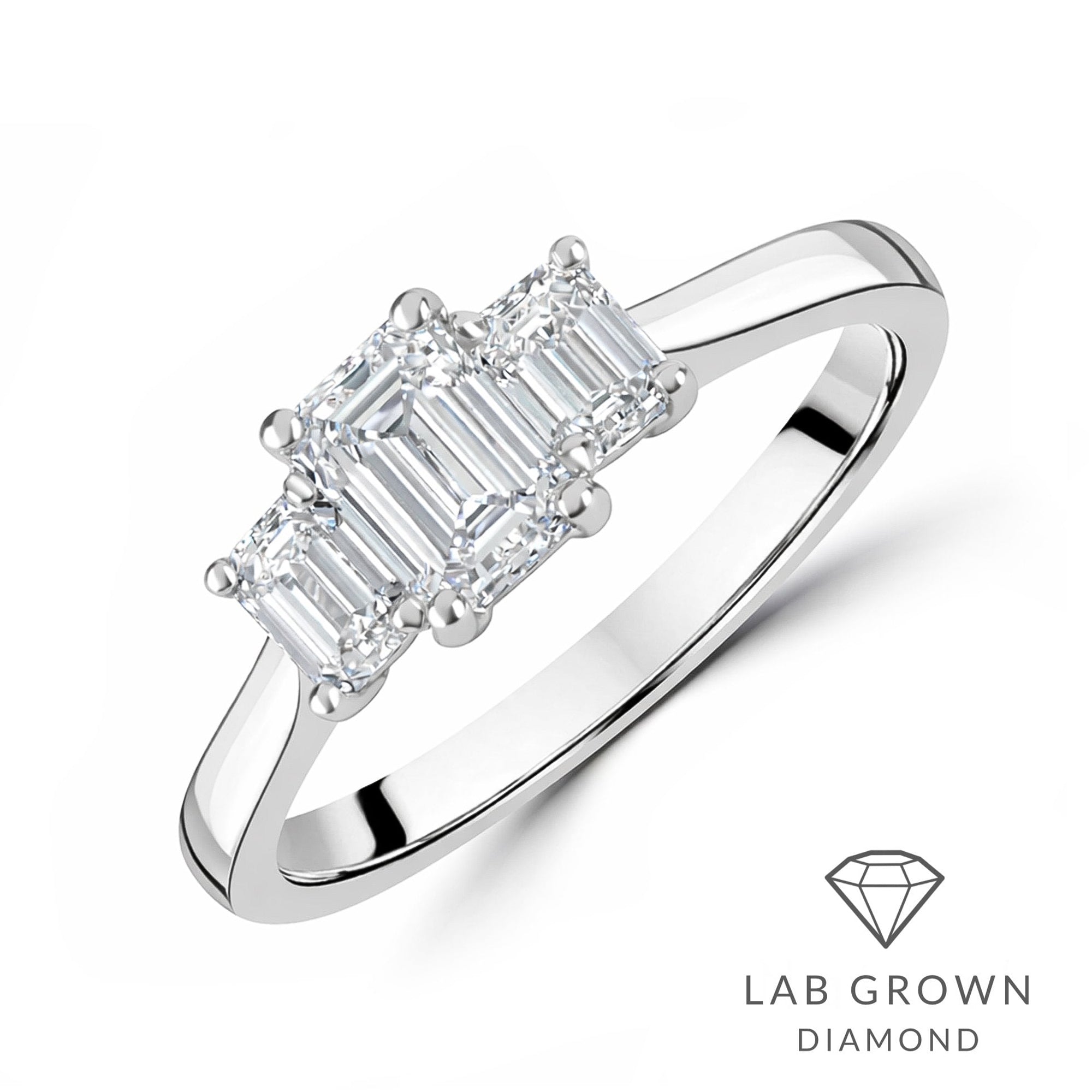 Platinum Emerald Cut Lab Grown Diamond Three Stone Engagement Ring