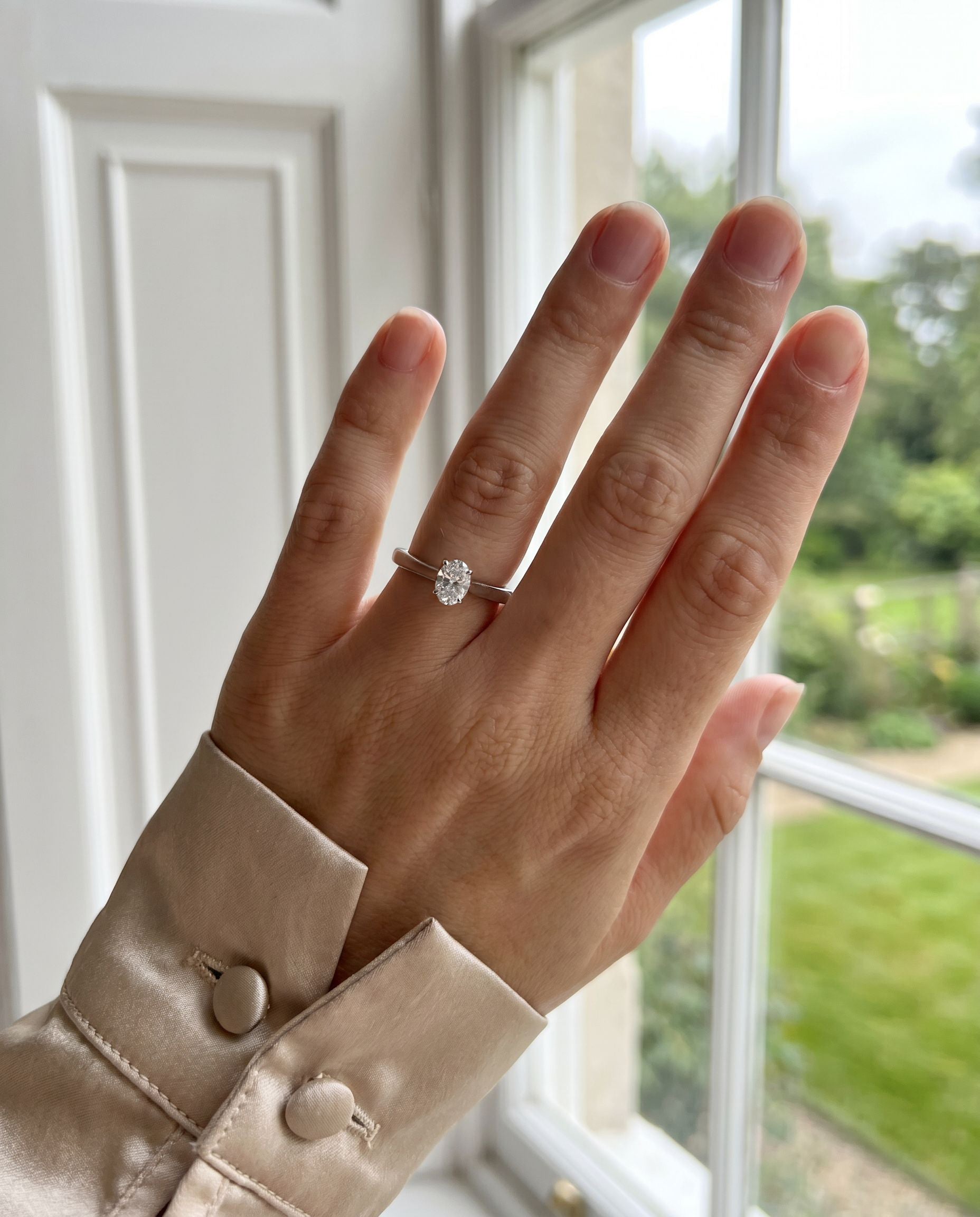 Platinum Oval Natural Diamond Solitaire Engagement Ring