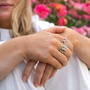 Platinum Round Ruby and Diamond Scalloped Edge Eternity Ring