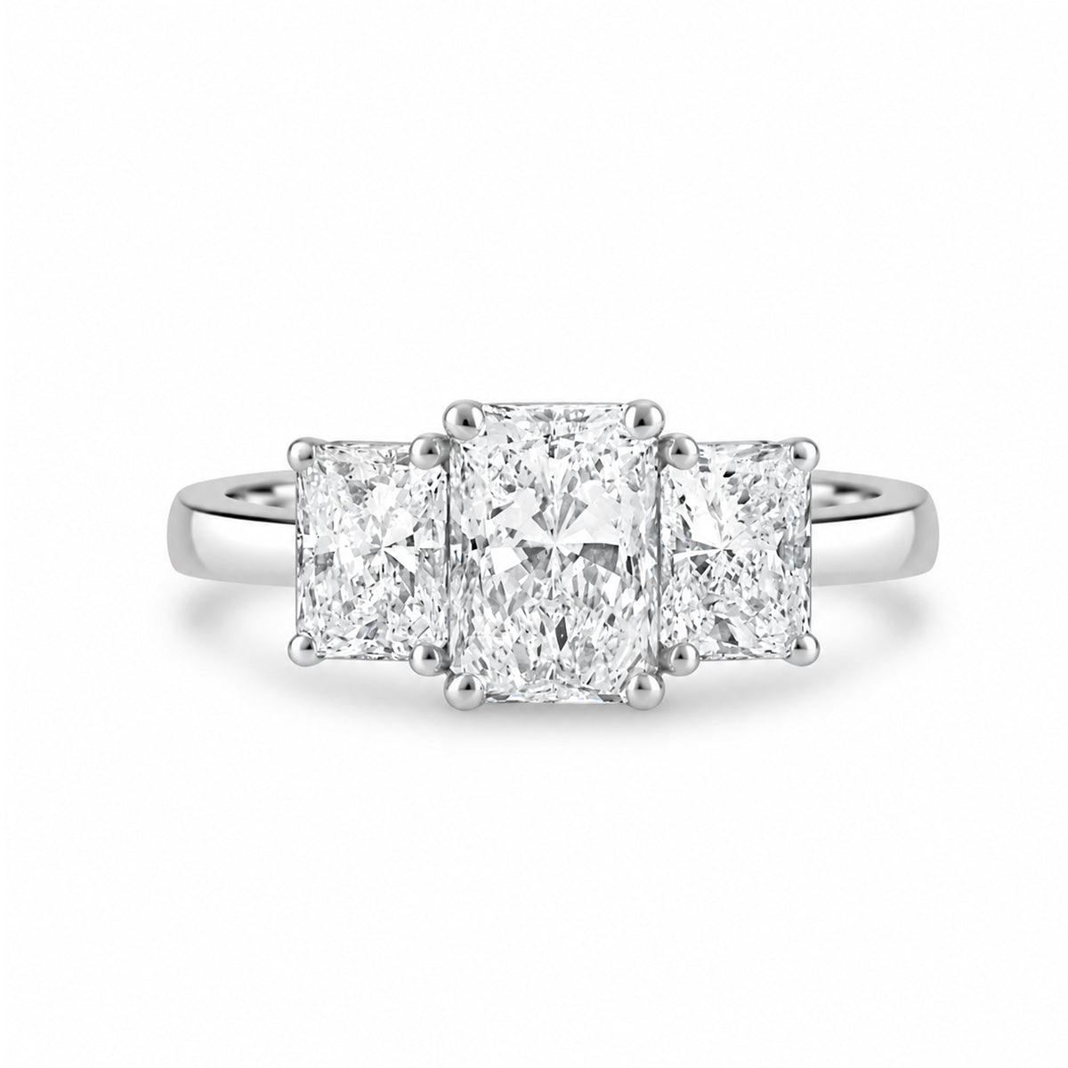 Platinum Three Stone Radiant Cut Diamond Ring