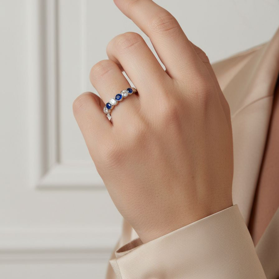 Platinum 0.59ct Round Sapphire and 0.67ct Round Diamond Seven Stone Scalloped Band Ring