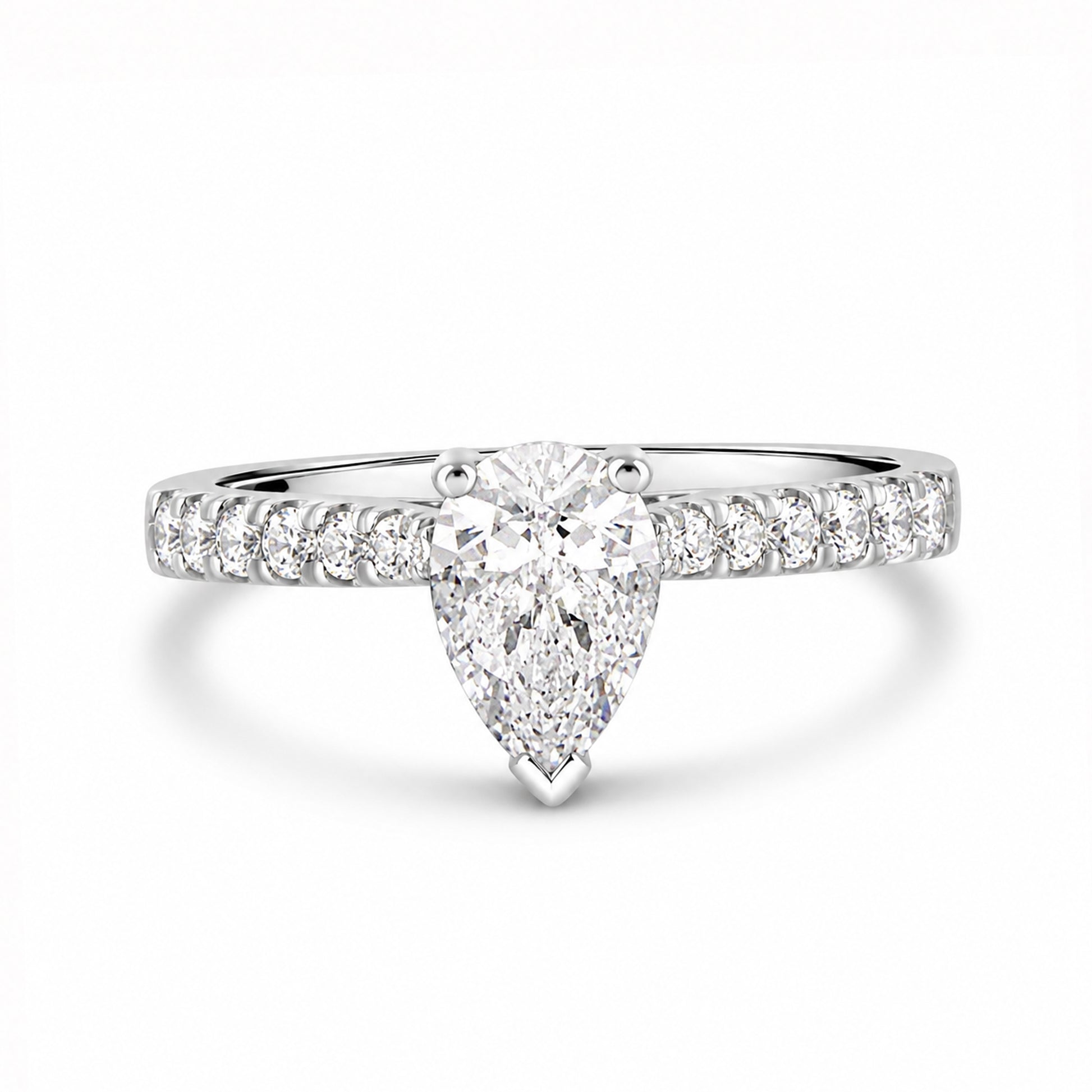 Silver Pear Cut CZ Ring with Graduated Claw Set Shoulders
