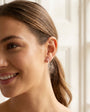 Silver Twisted Ribbon Drop Earrings with Open Eye Shaped Cut-Out